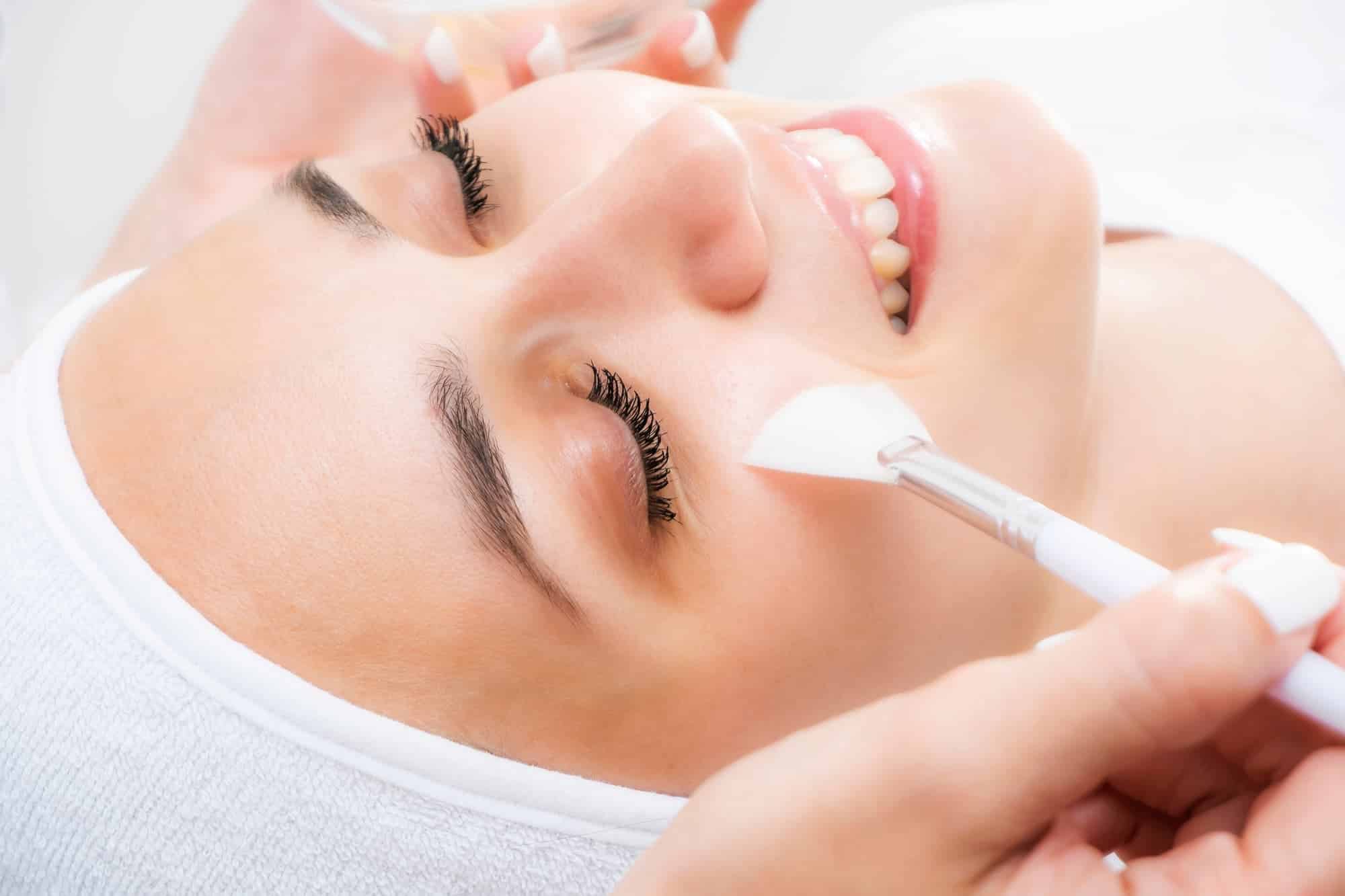 closeup of a woman getting a chemical peel treatment