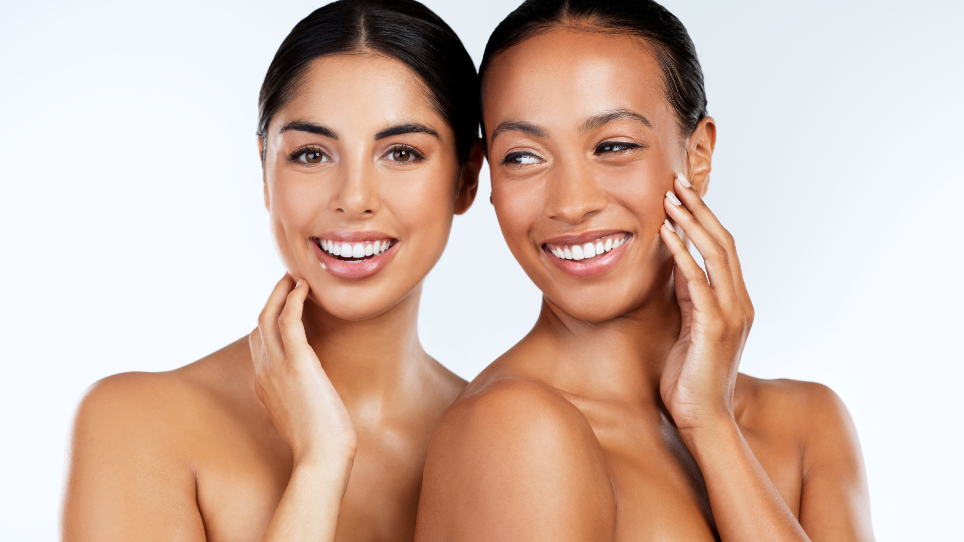 Two individuals flexing their smooth and clear skin.