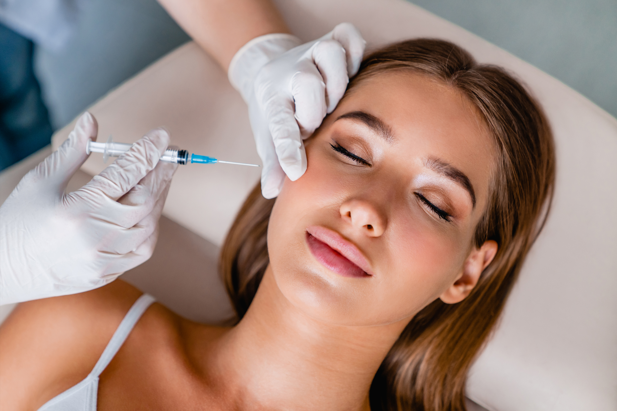 female patient getting cheek fillers