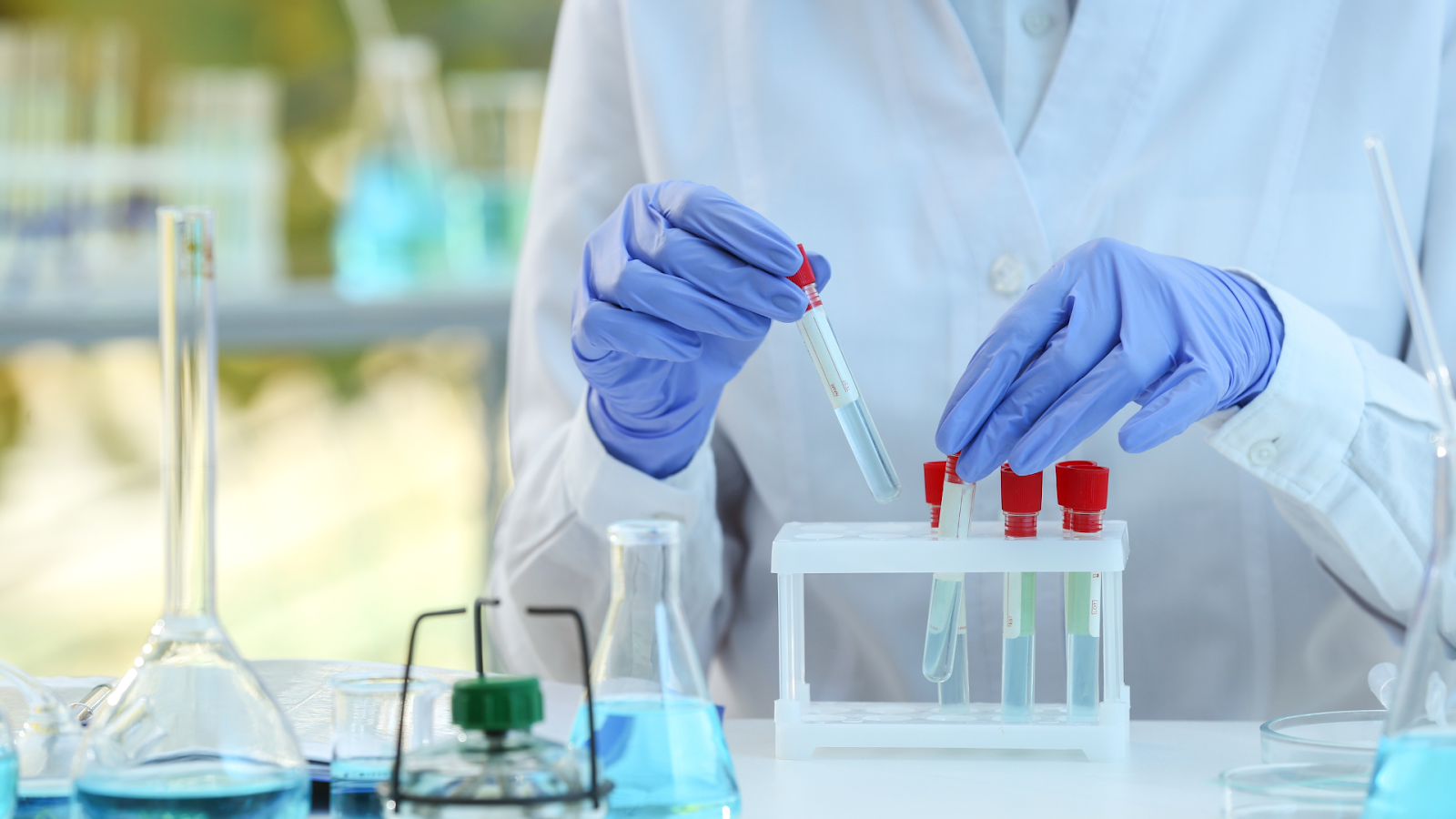 A scientist creating formulations in the laboratory.