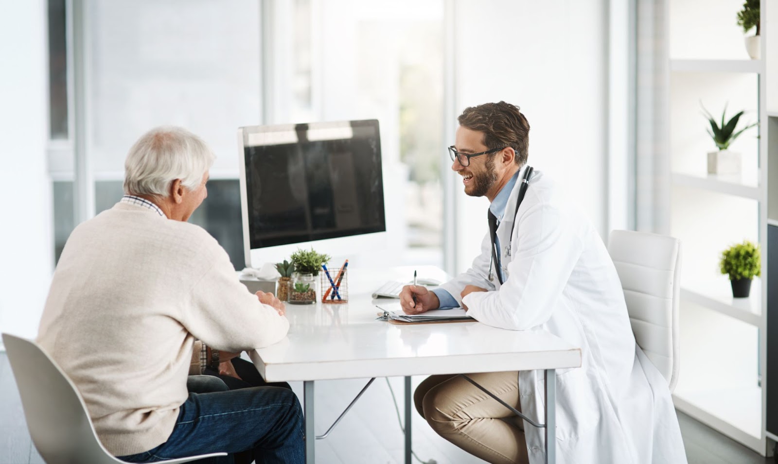 A patient consulting their doctor about a treatment.