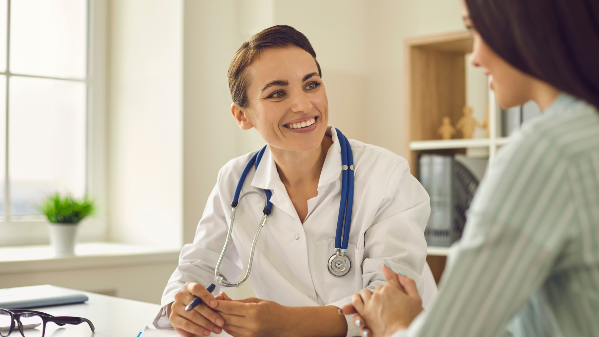 A patient and doctor consultation.