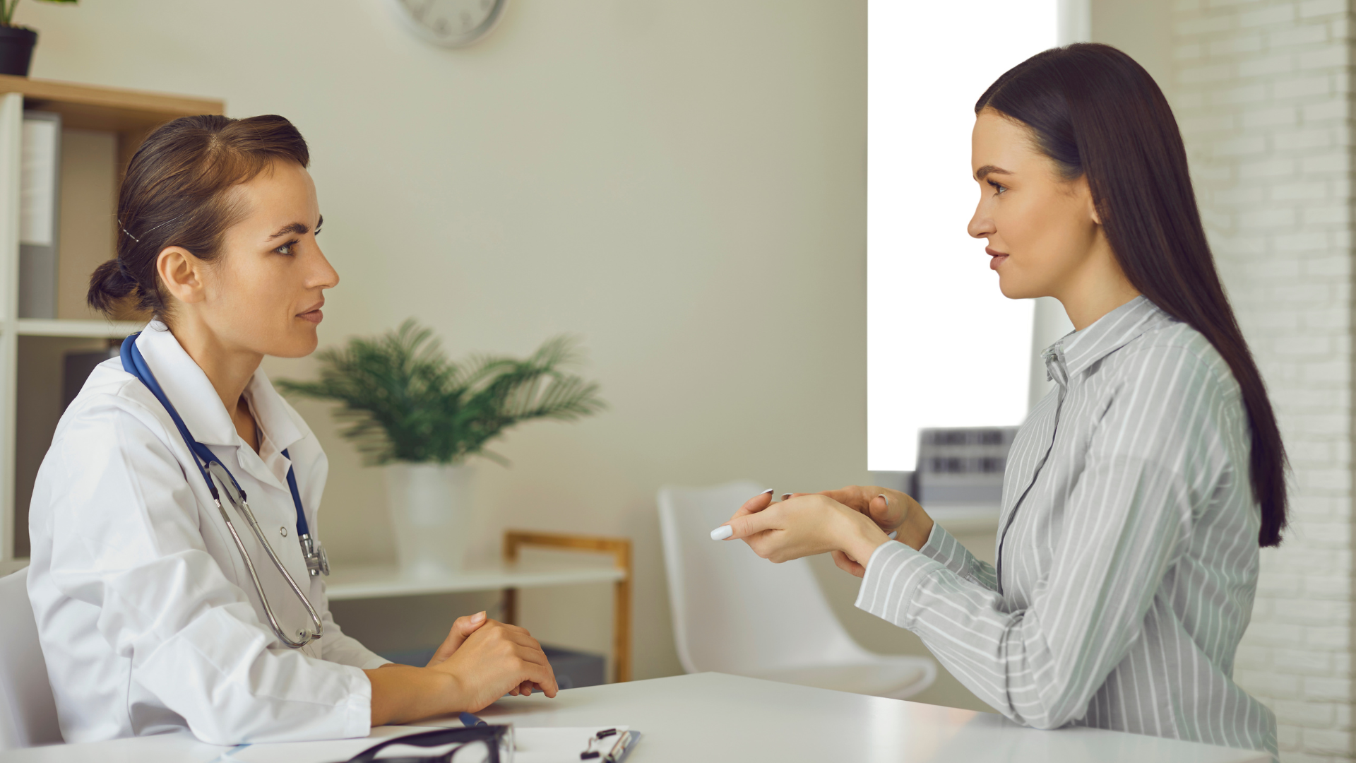 A professional discussing the treatment plan with the patient.