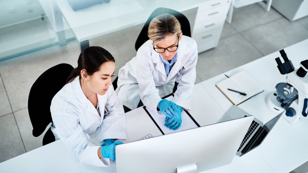 Medical researchers analyzing the clinical results.