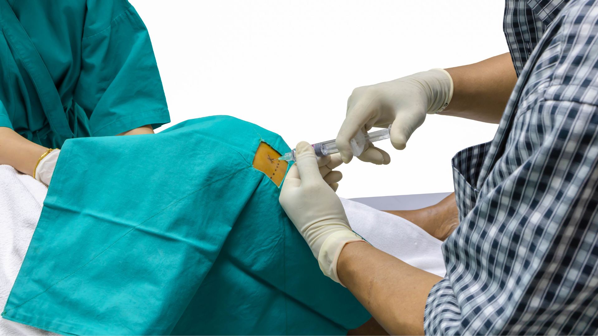 A healthcare provider administering a knee injection.