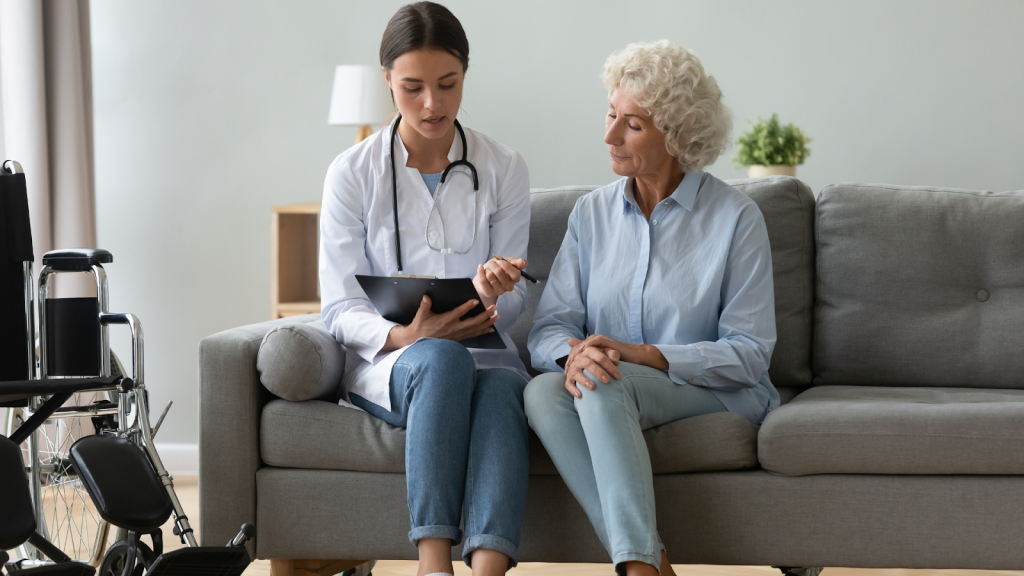 An older woman consulting with a medical professional about her condition.