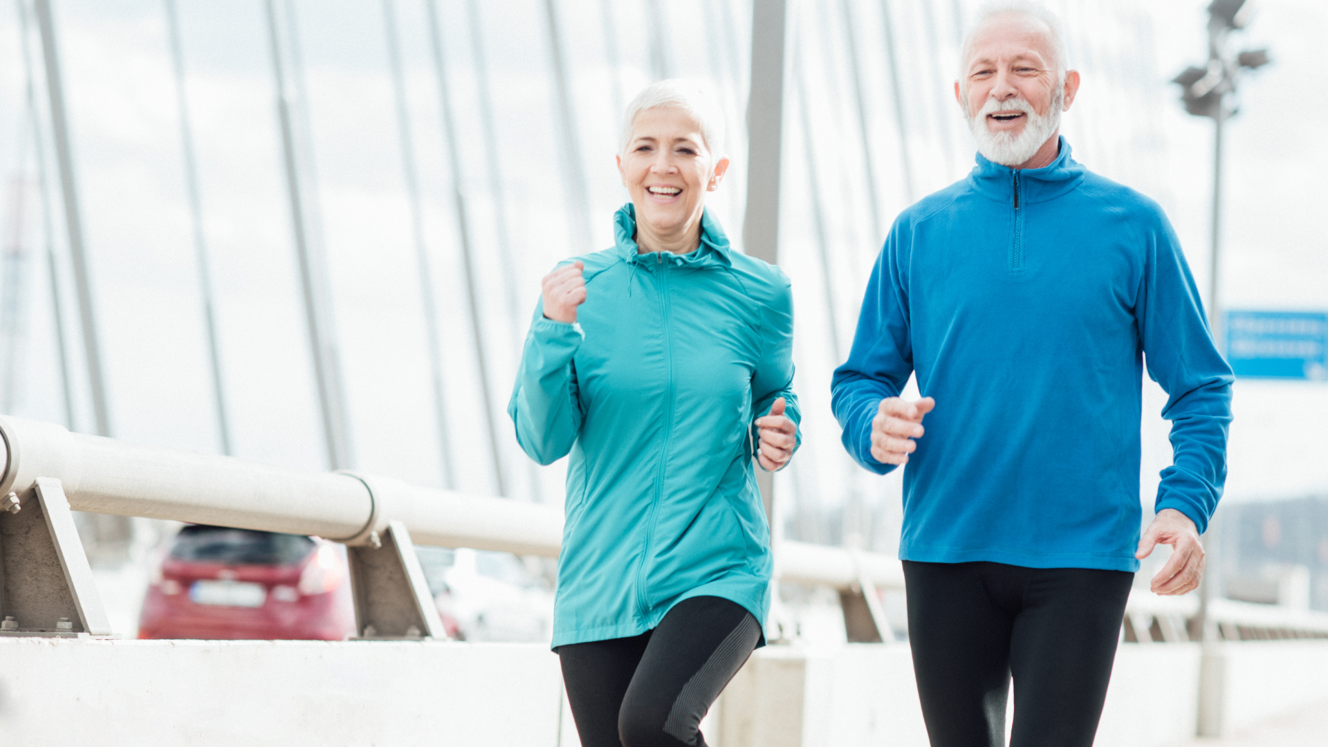 Older individuals exercising through jogging.