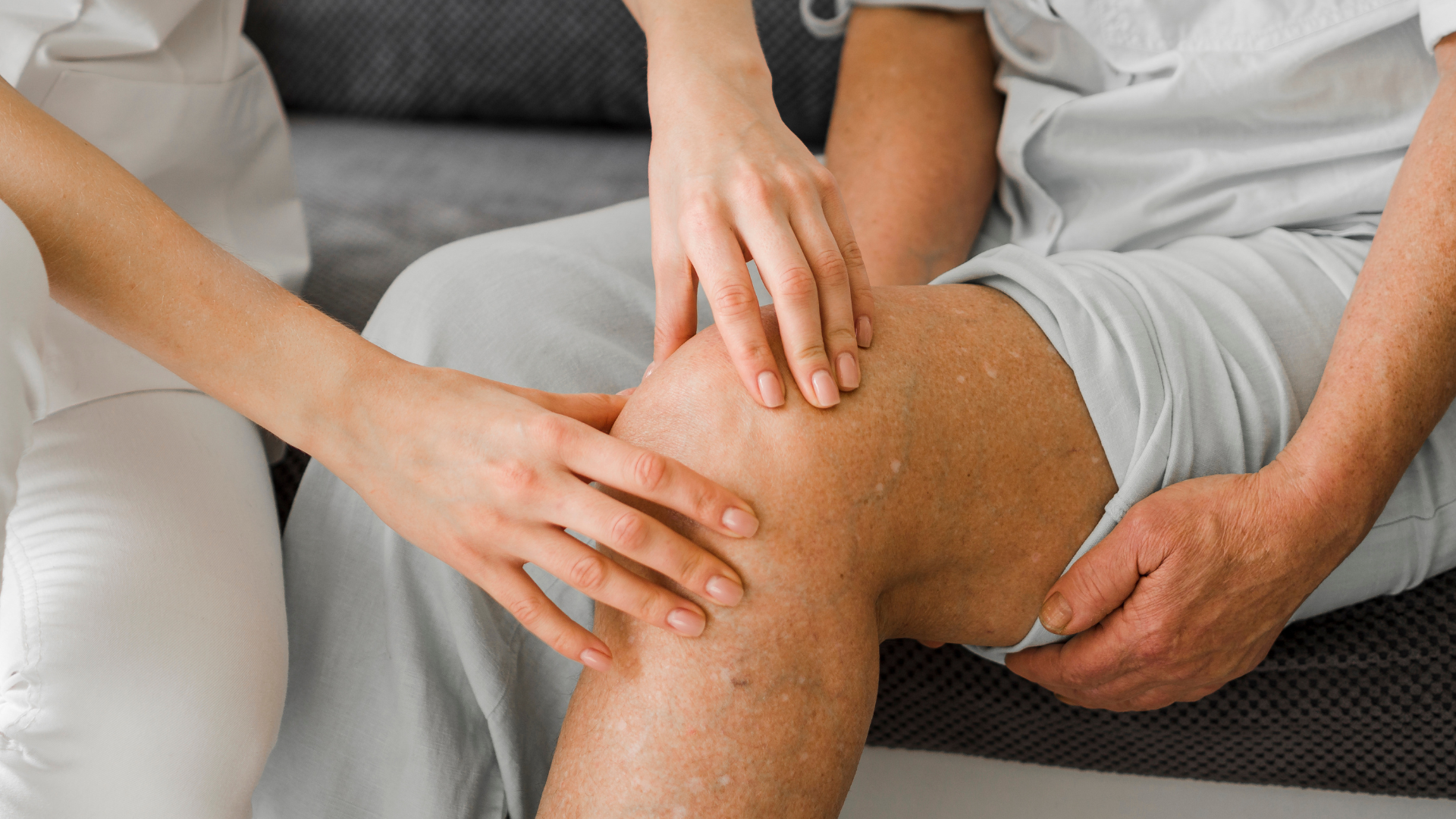 A healthcare provider examining the patient's knee.