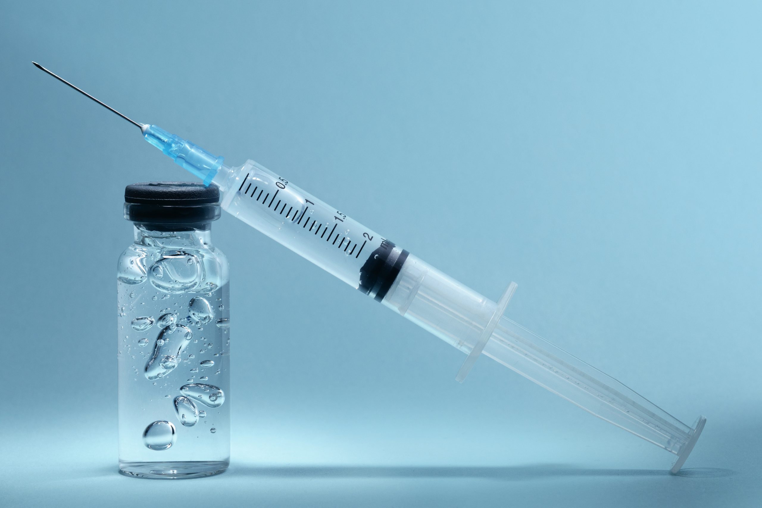 A close-up shot of a hyaluronic acid injection.