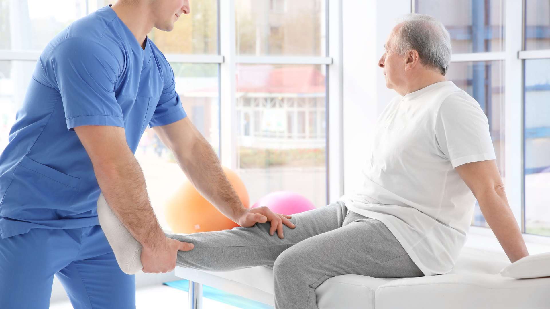 An older individual undergoing physical therapy.