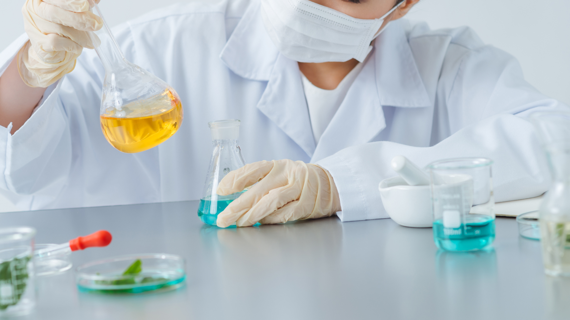 A medical scientist examining the formulations.