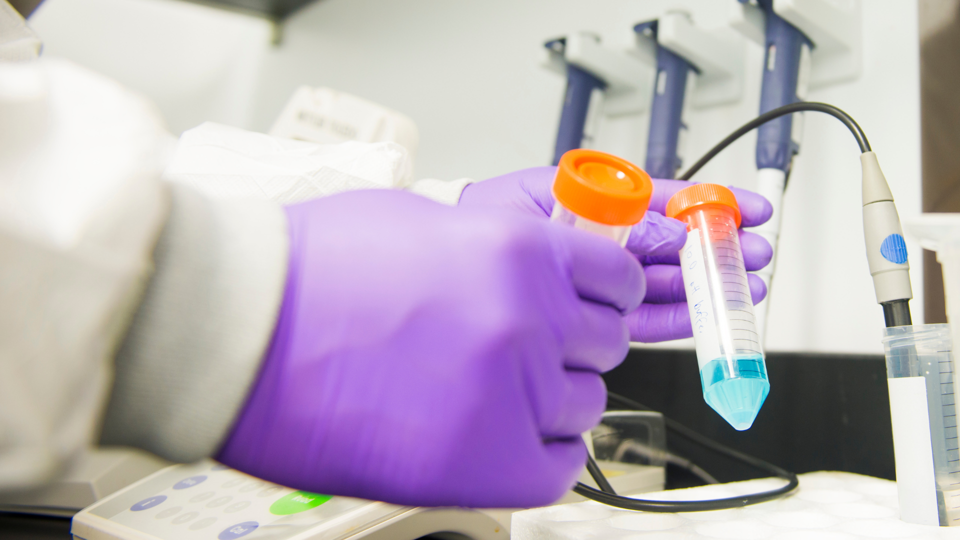 A scientist in a laboratory creating product formulations.