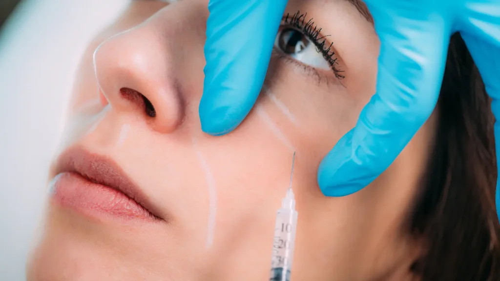 A patient undergoing a facial injection enhancement.