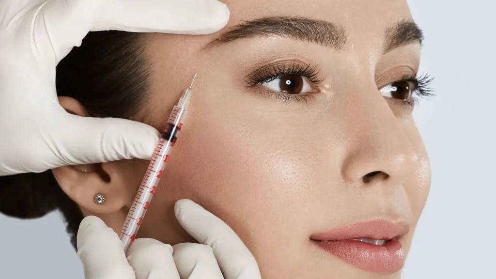 A patient receiving injection for their concerns around the eyes.