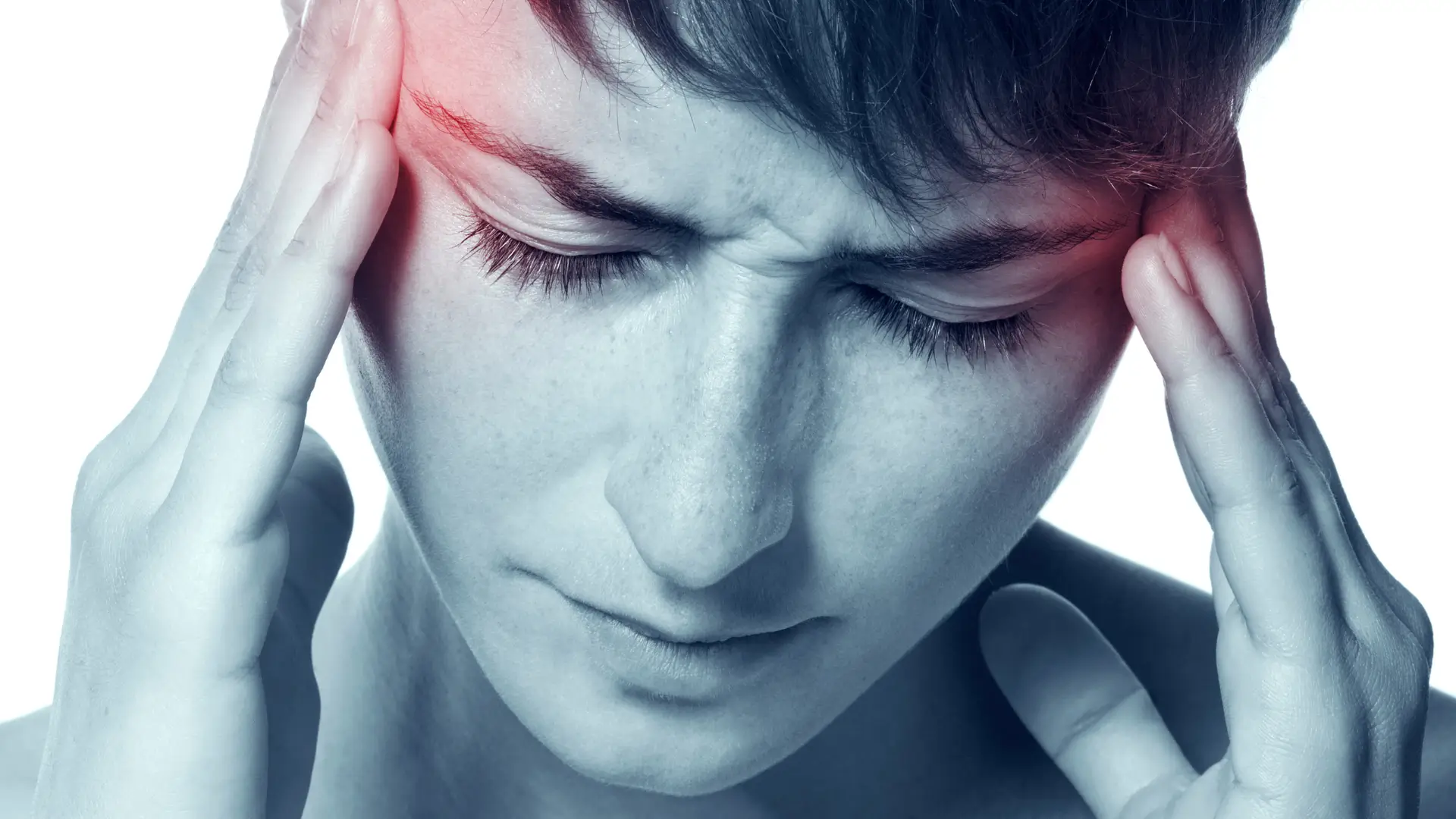 An individual suffering from severe migraine.