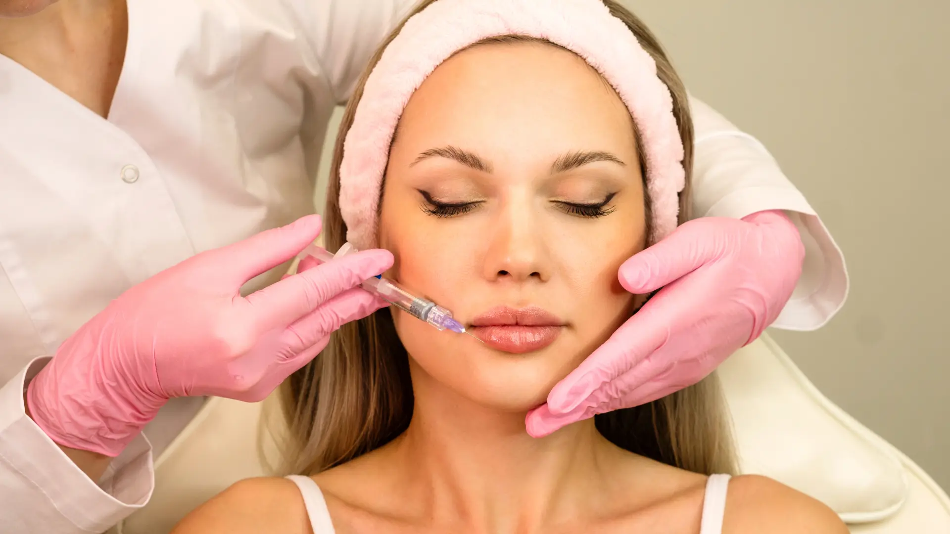 A patient undergoing a lip injection.