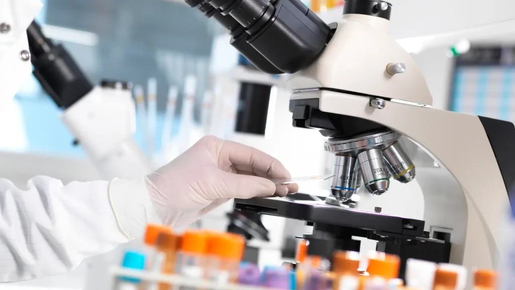 A medical expert examining an injectable solution in the laboratory.