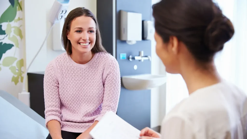 A doctor and patient discussing a treatment.