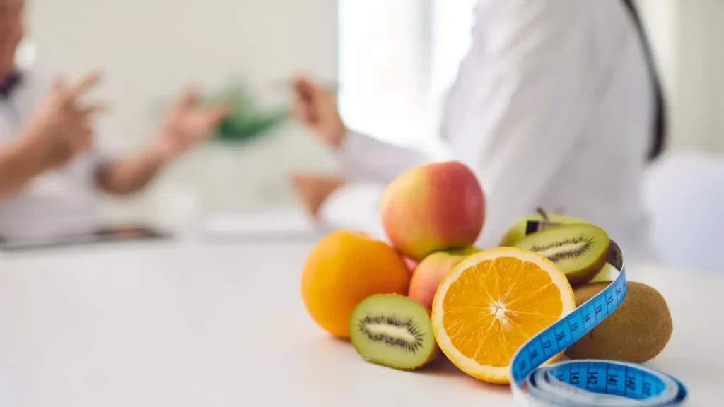 A doctor and patient having a discussion and consultation on weight-related concerns.