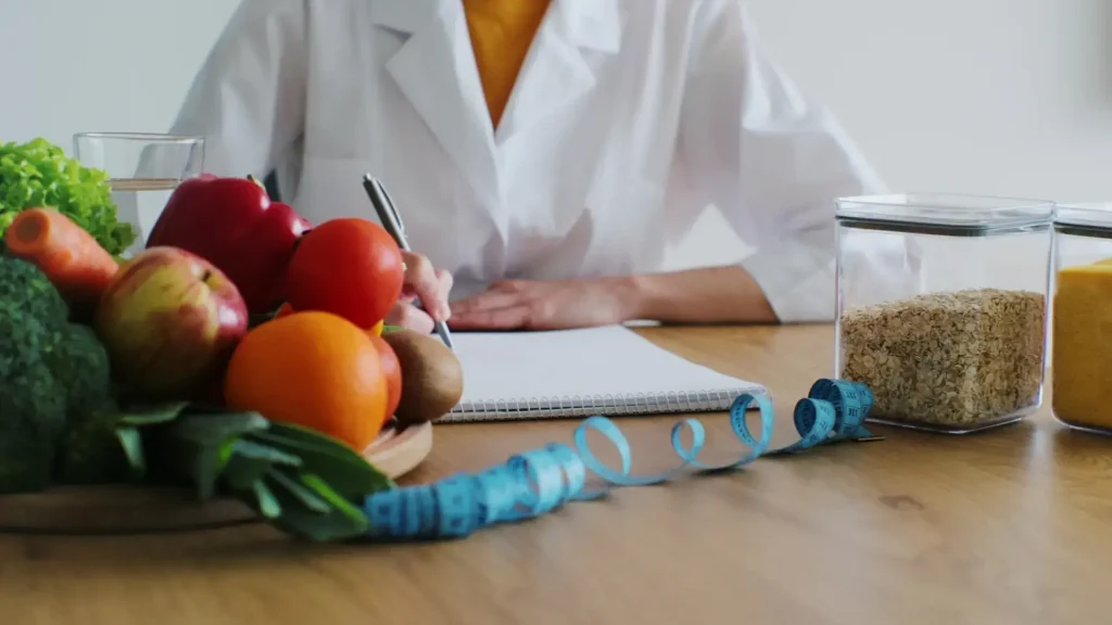 A medical professional preparing the prescription for patients.