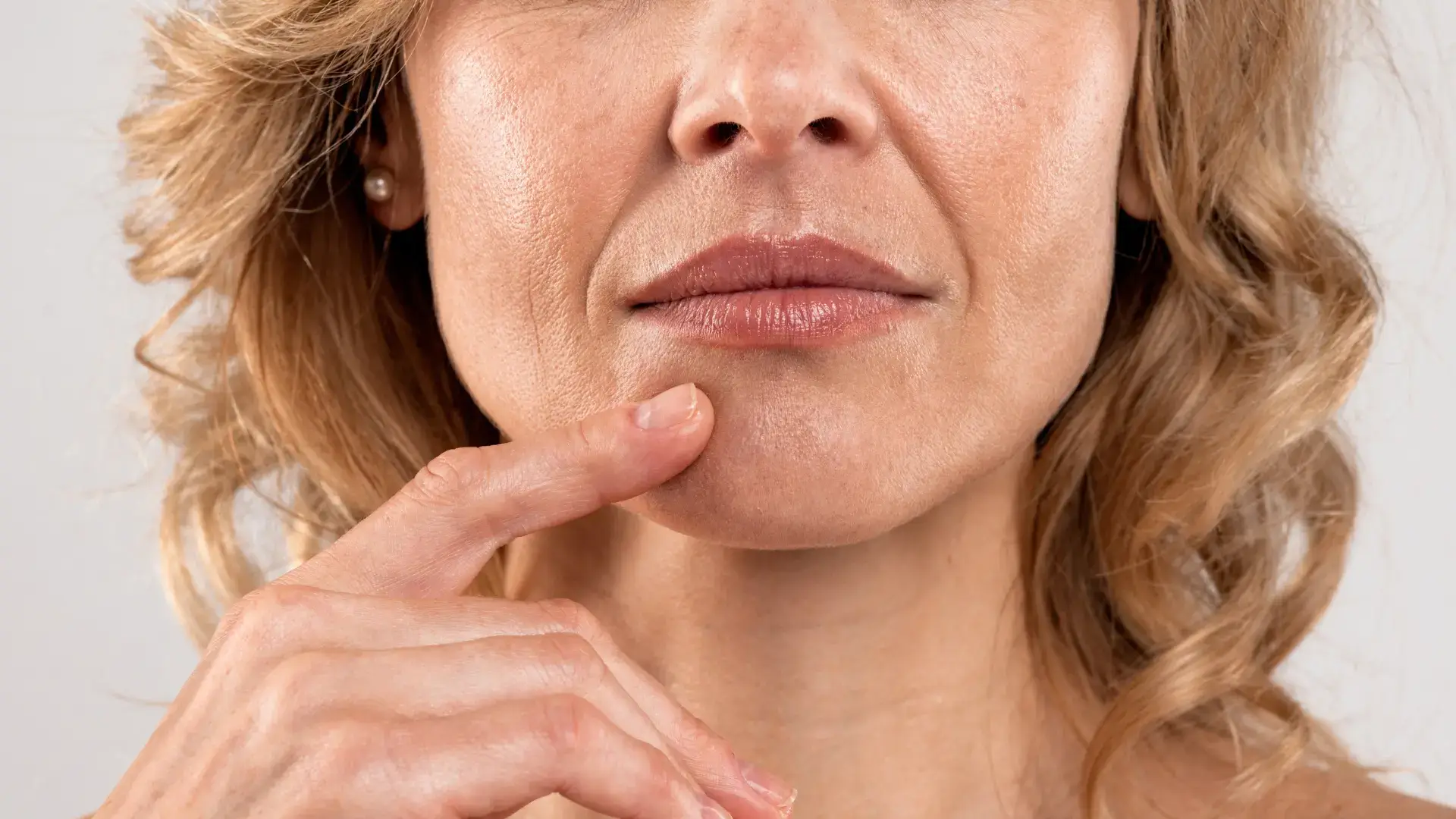 A close-up shot of an individual in their lower face region.