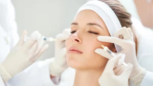 An individual receiving facial injections for their skin concerns.